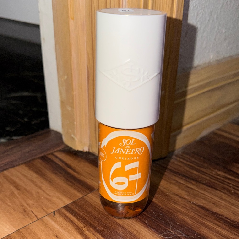 Sol de Janeiro Cheirosa 62 with White Cap and Orange Bottle